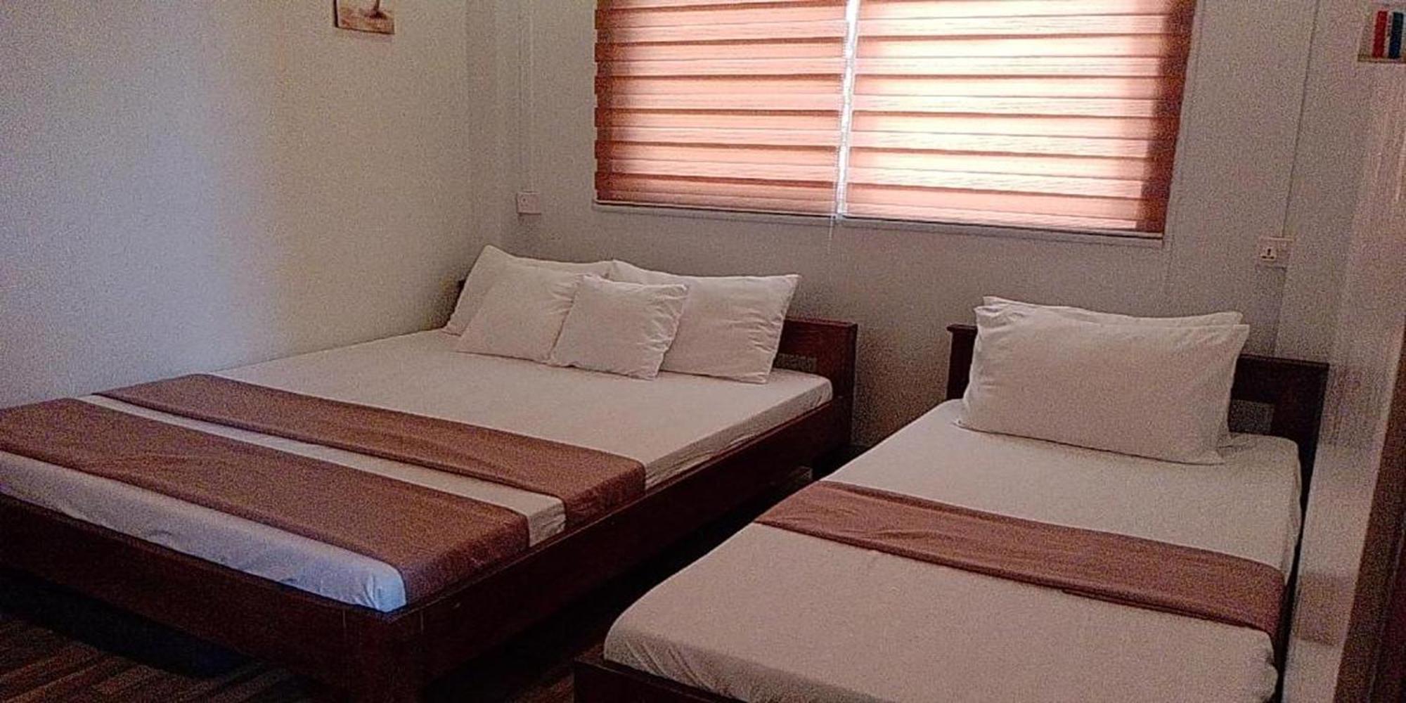 Fnt Transient House Near Hundred Islands Hotel อลามินอส ภายนอก รูปภาพ