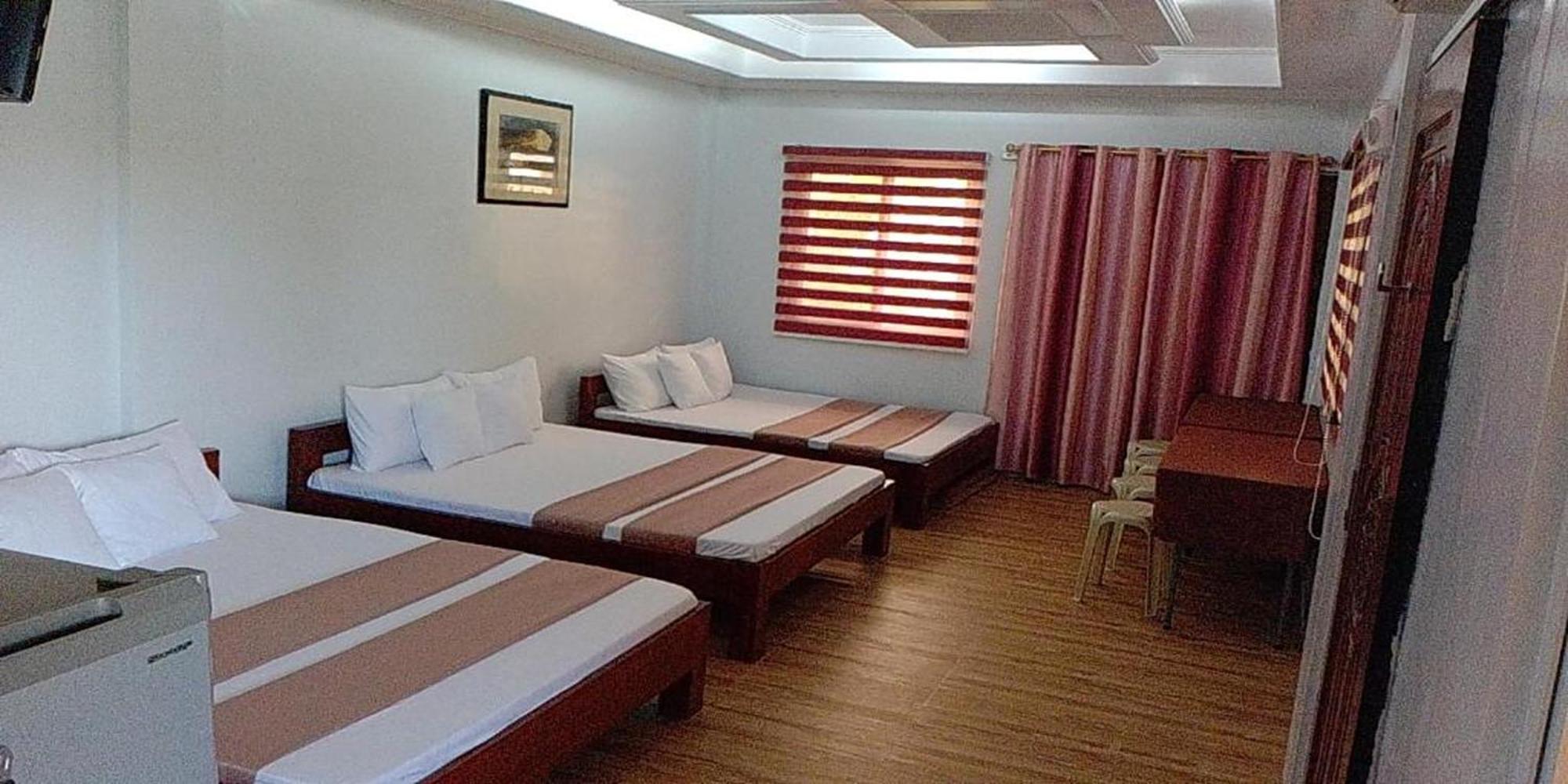 Fnt Transient House Near Hundred Islands Hotel อลามินอส ภายนอก รูปภาพ